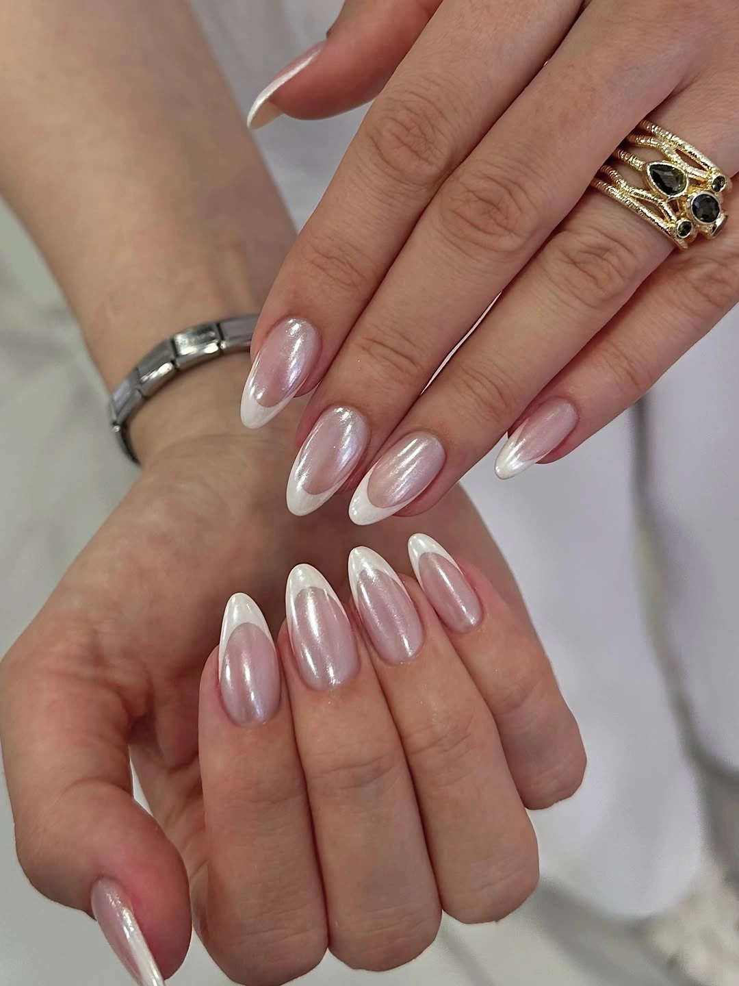 Long almond nails with pale pink and pearly white French edges