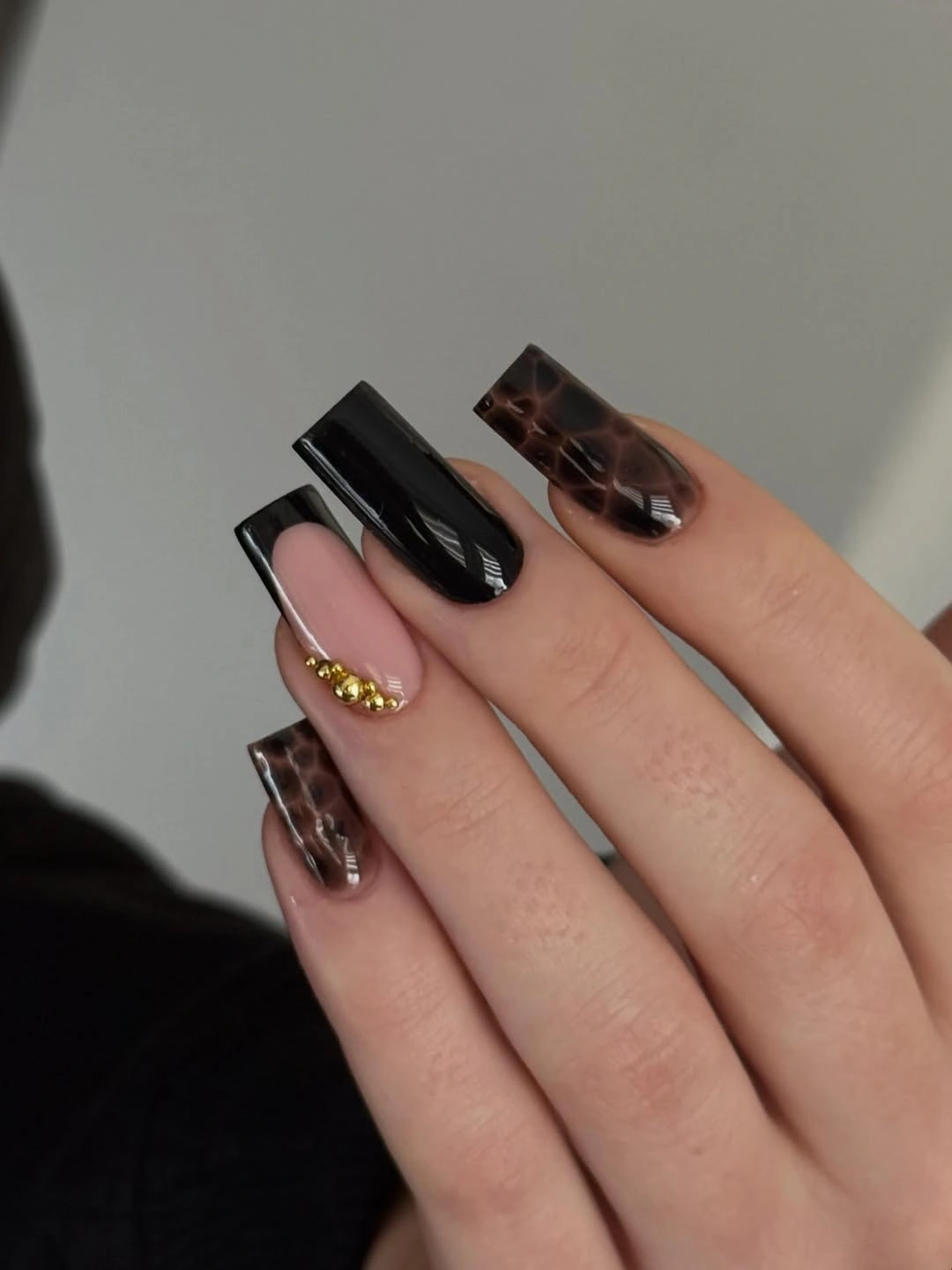 Long square nails with black gloss brown patterns and gold accents