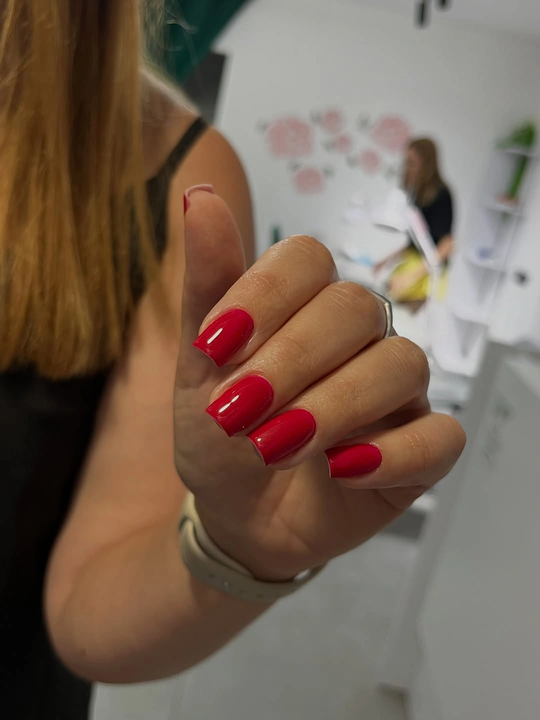 Medium square nails in a vivid glossy red shade
