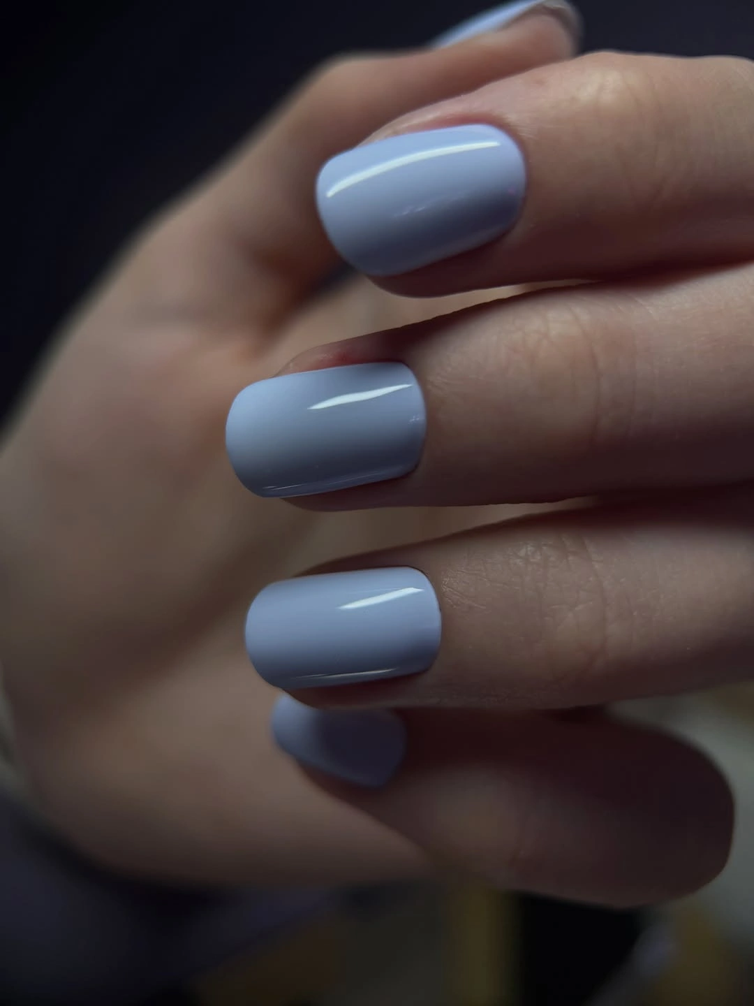 Short square nails in glossy pale periwinkle blue