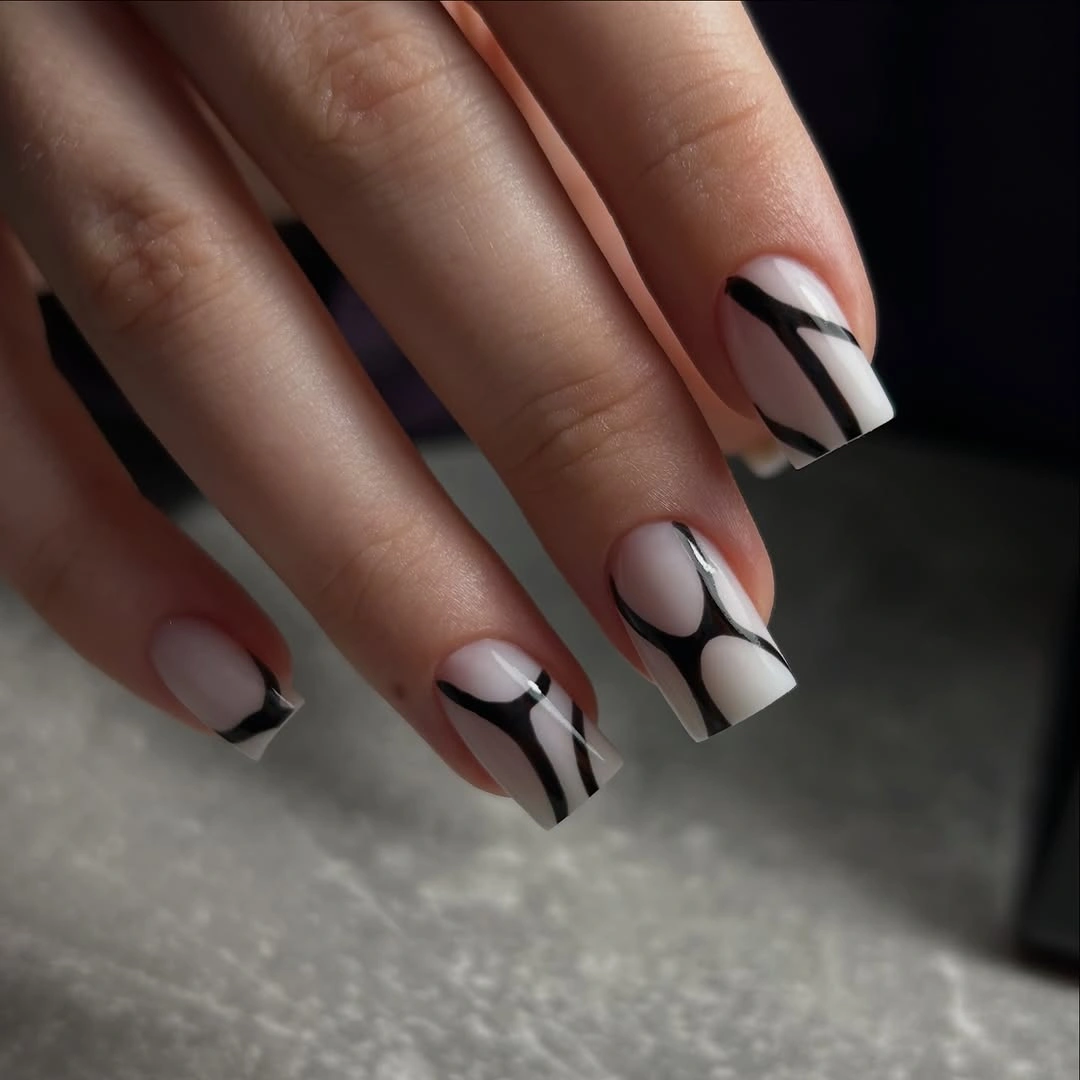 Medium square pale nails with black curved graphic lines