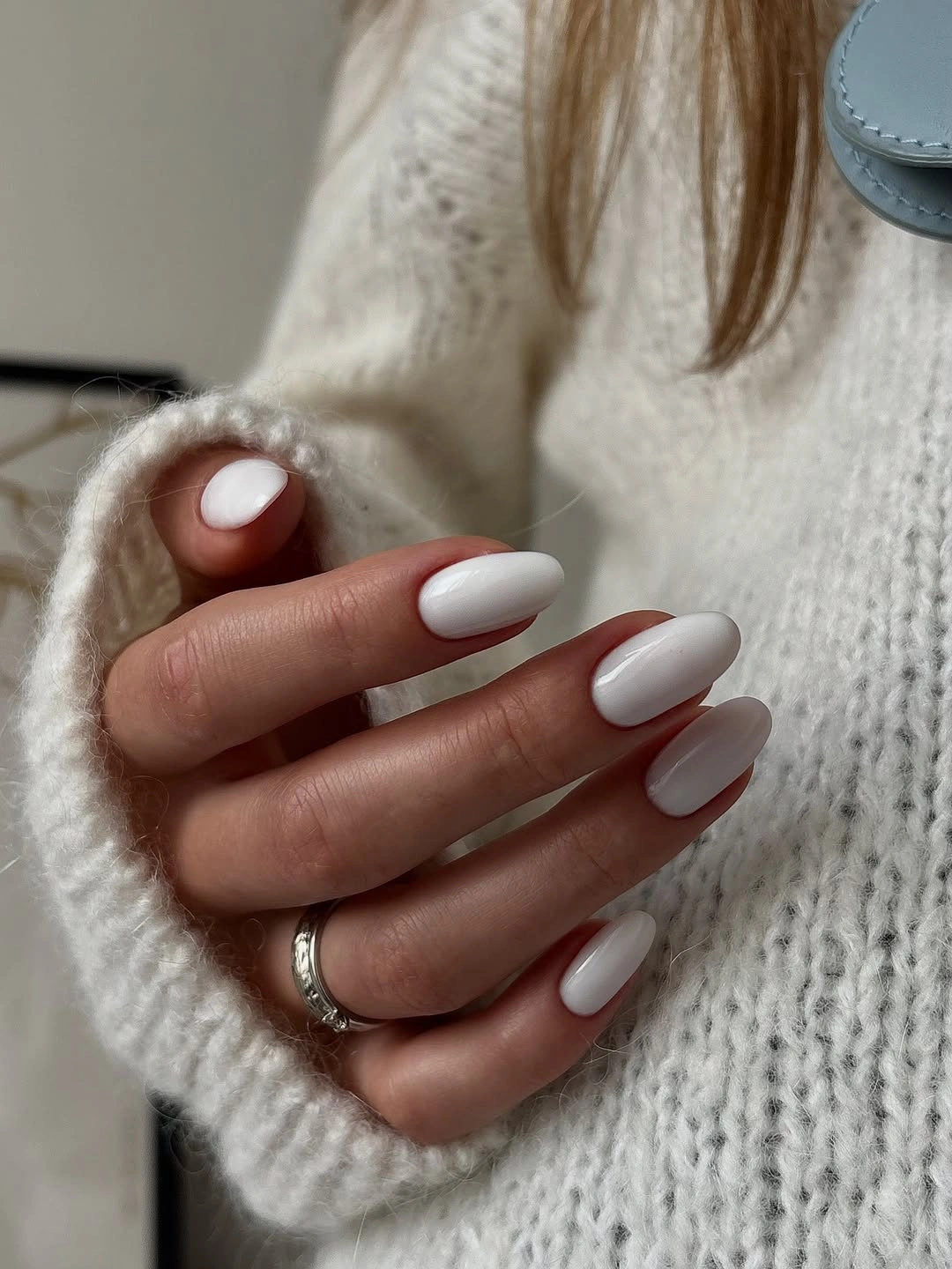 Medium oval nails in glossy milky white