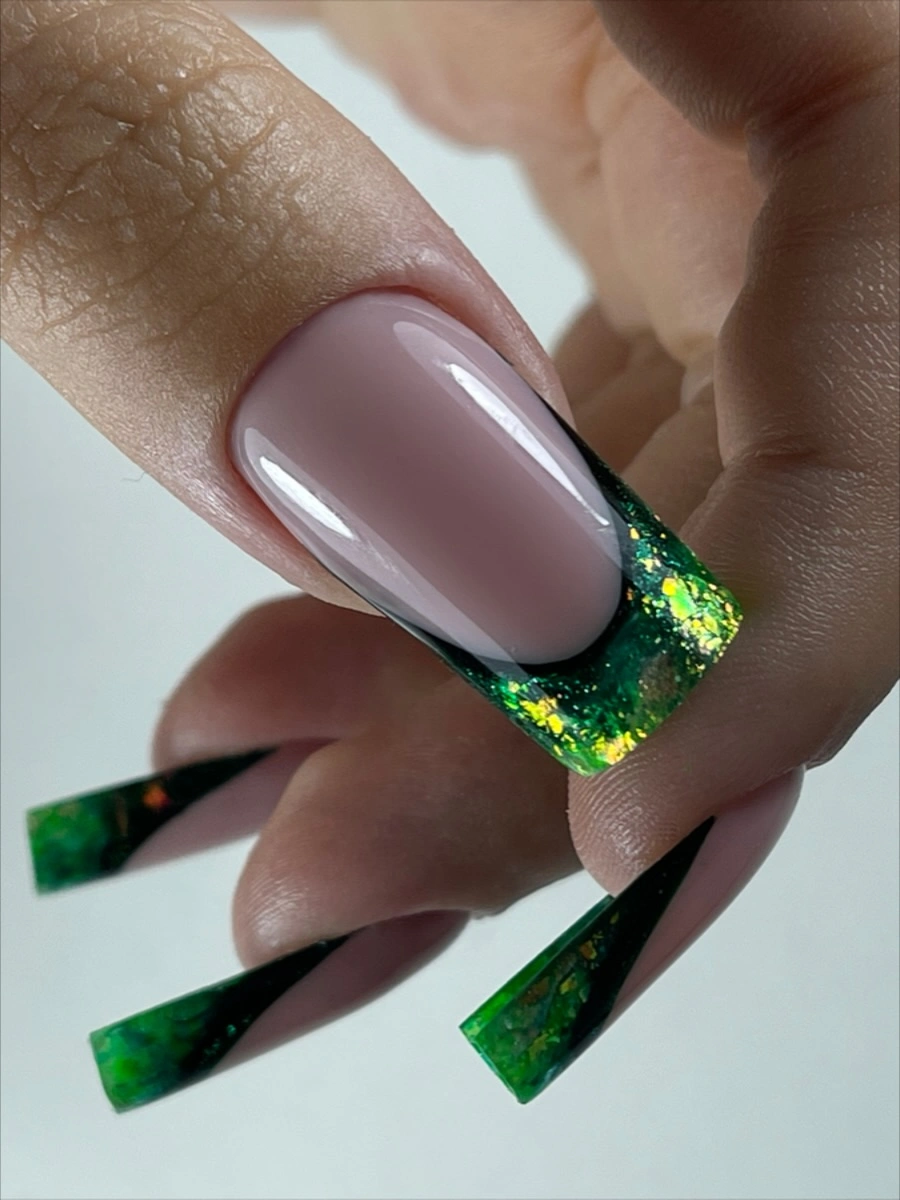 Long square mauve nails with bright green sparkling tips