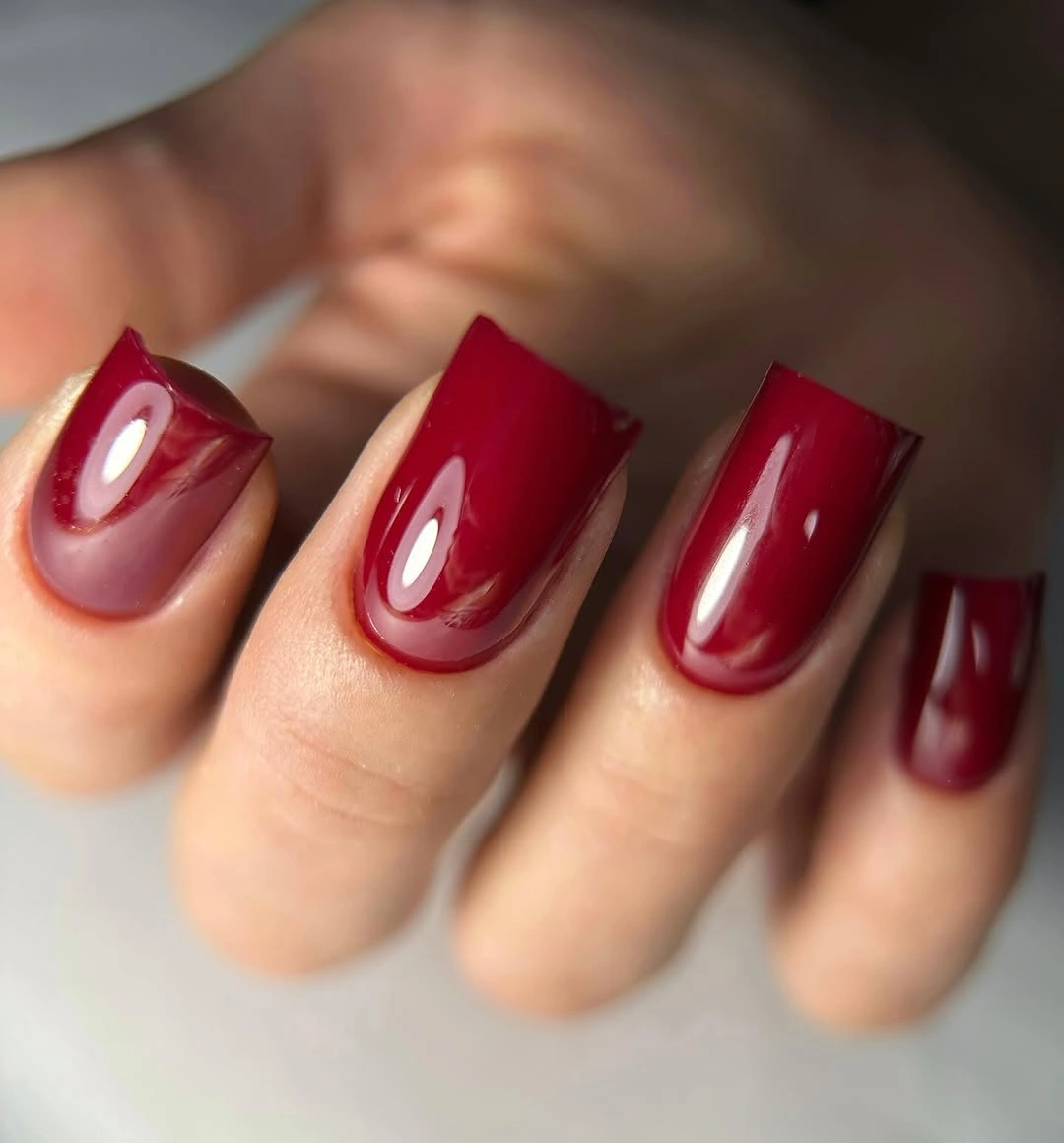 Long square nails in glossy saturated deep red