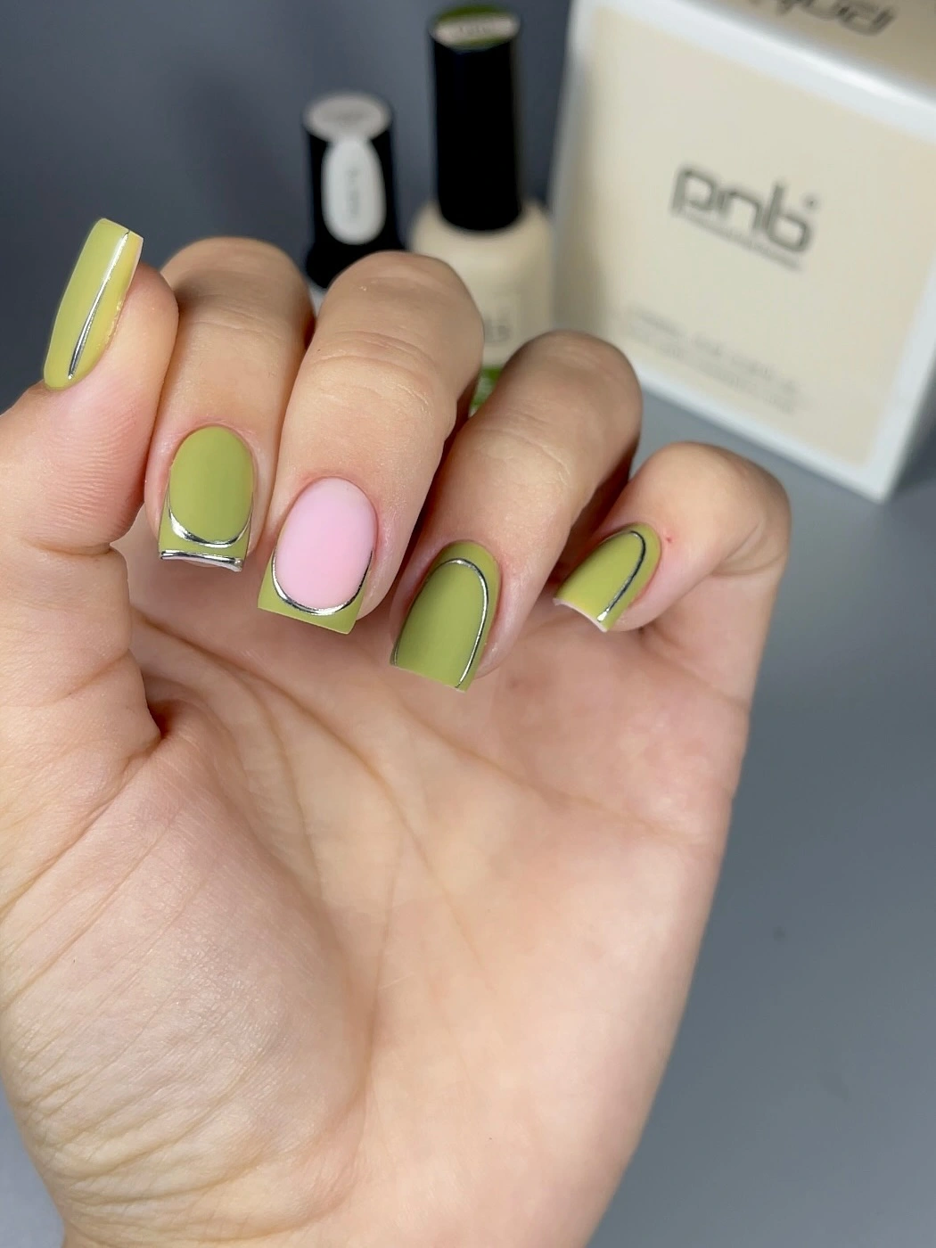 Medium almond nails with lime pink curved accents