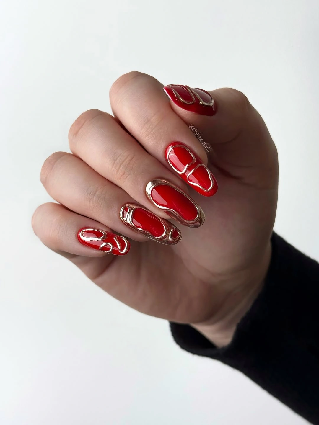 Long coffin red nails with white and silver looping accents