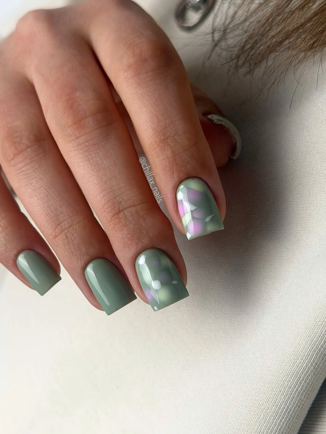 Medium square sage nails with one soft iridescent multicolor accent