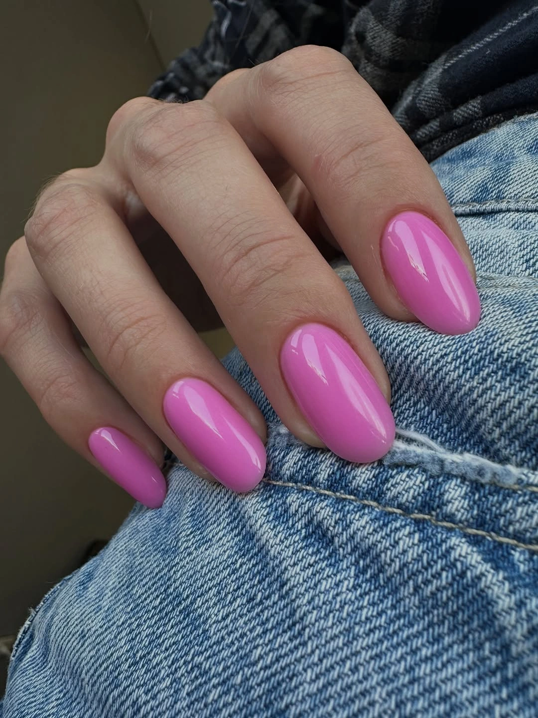 Medium almond nails in vivid hot pink