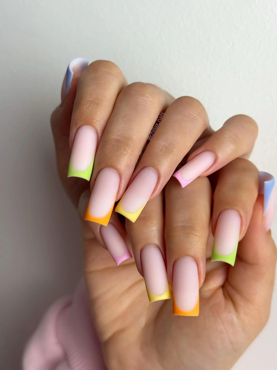 Medium square pale nails with pastel yellow pink and lime tips