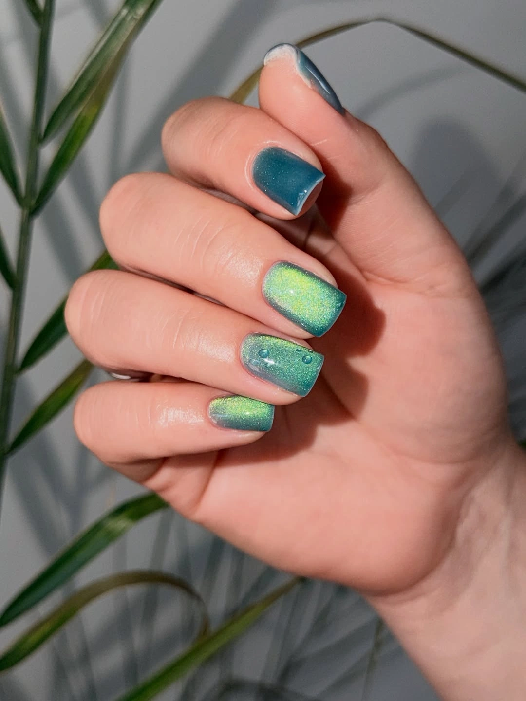 short teal square nails with lime shimmer finish