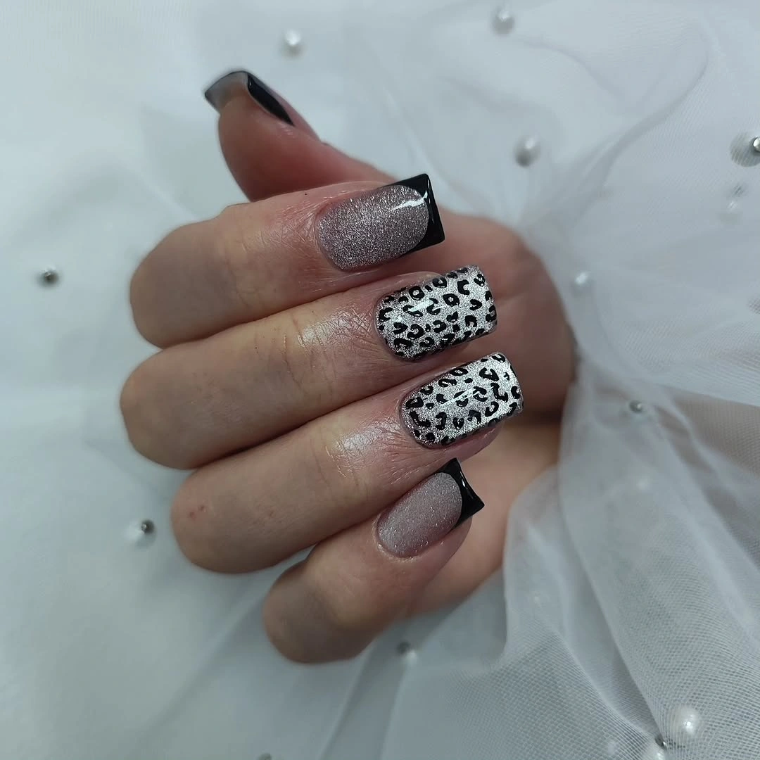 silver leopard nails with black French tip accents