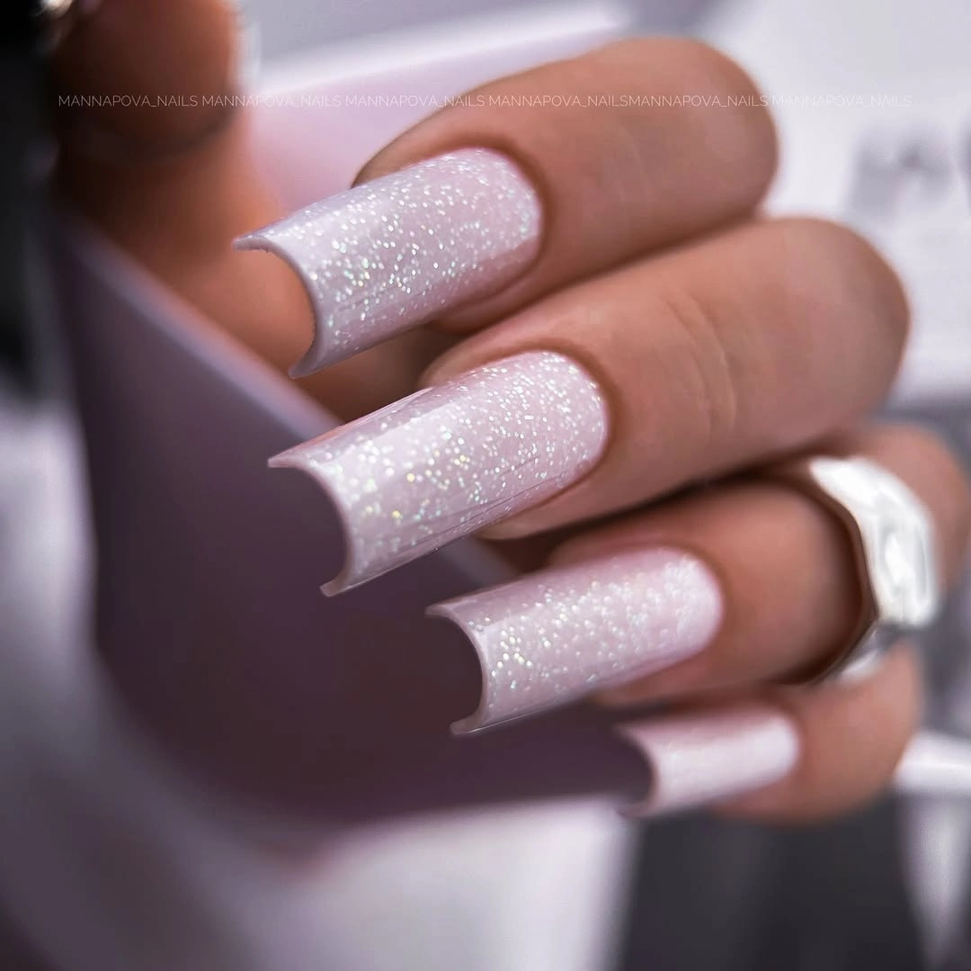 Long square nails in pale lilac pink glitter finish