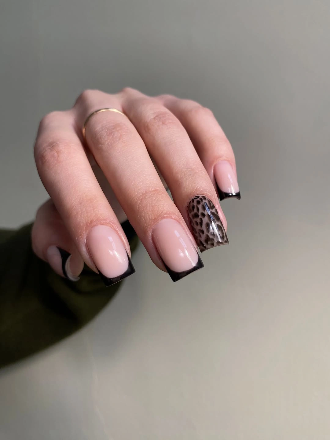 Medium square pink French nails with tortoiseshell accent