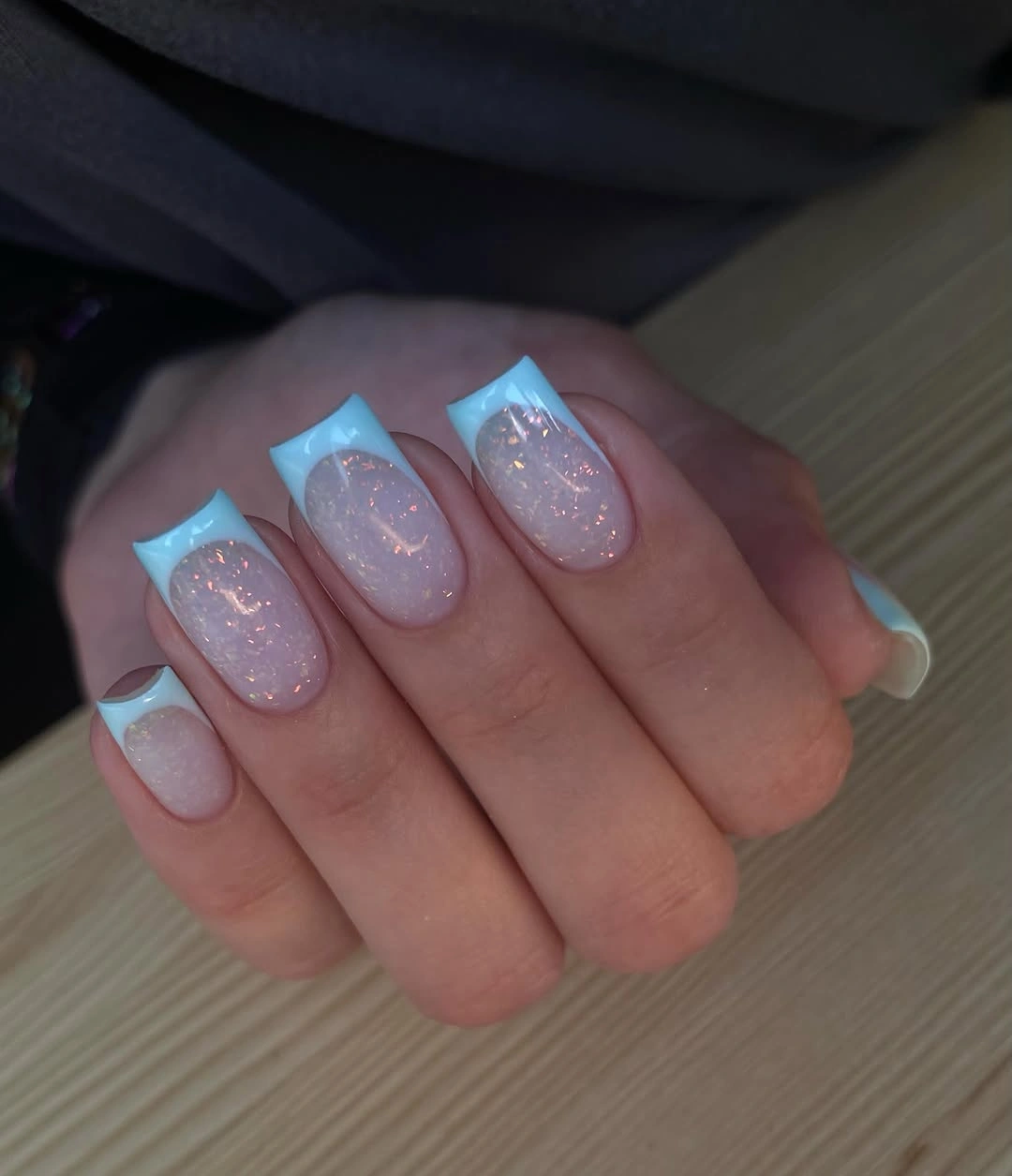 Medium square nails with lavender sparkle and pale blue edges
