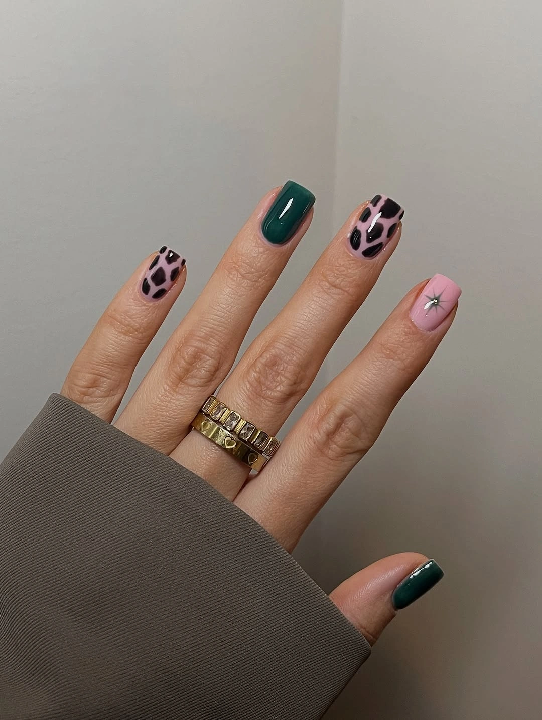 Teal and pink spotted short square nails