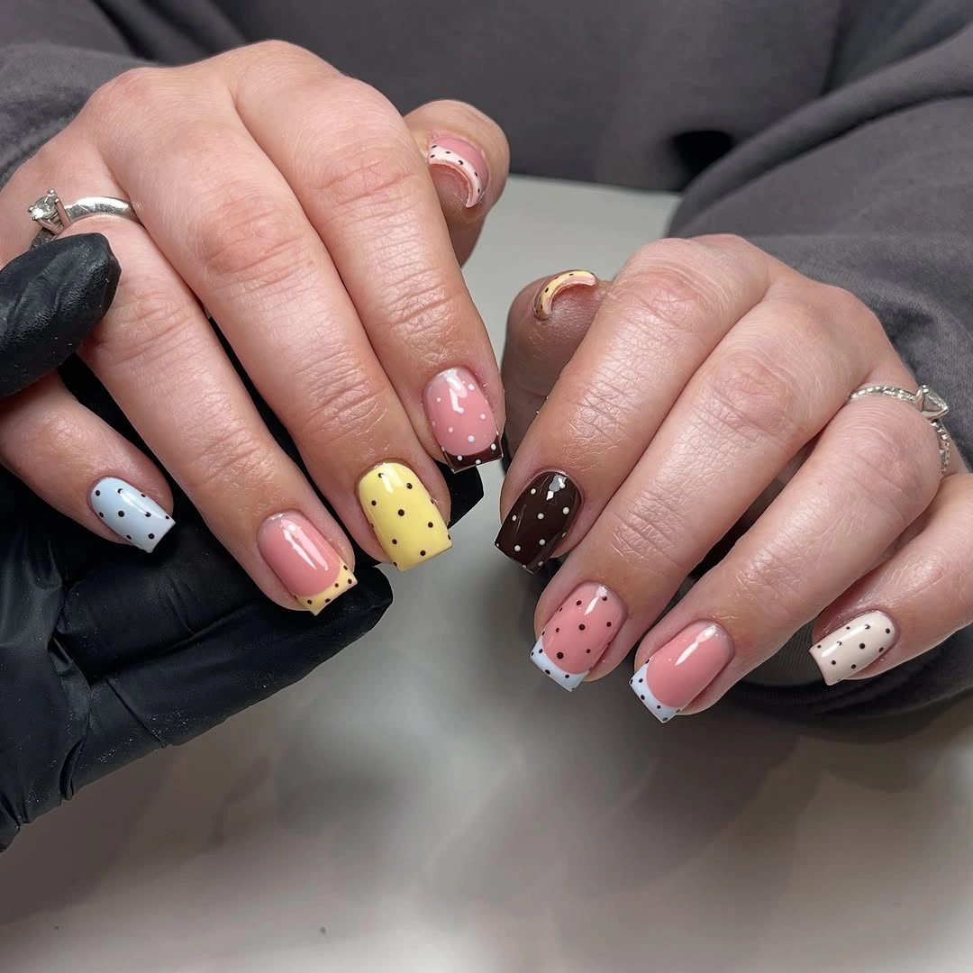 Mixed color polka dot French tip nails