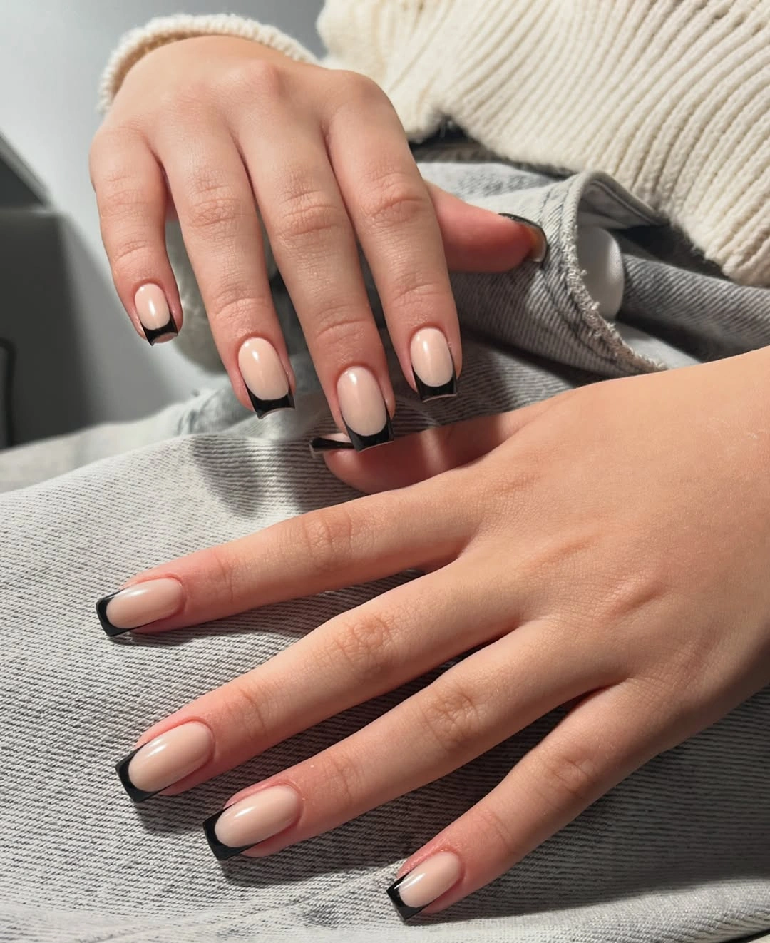 Nude square nails with black French tips