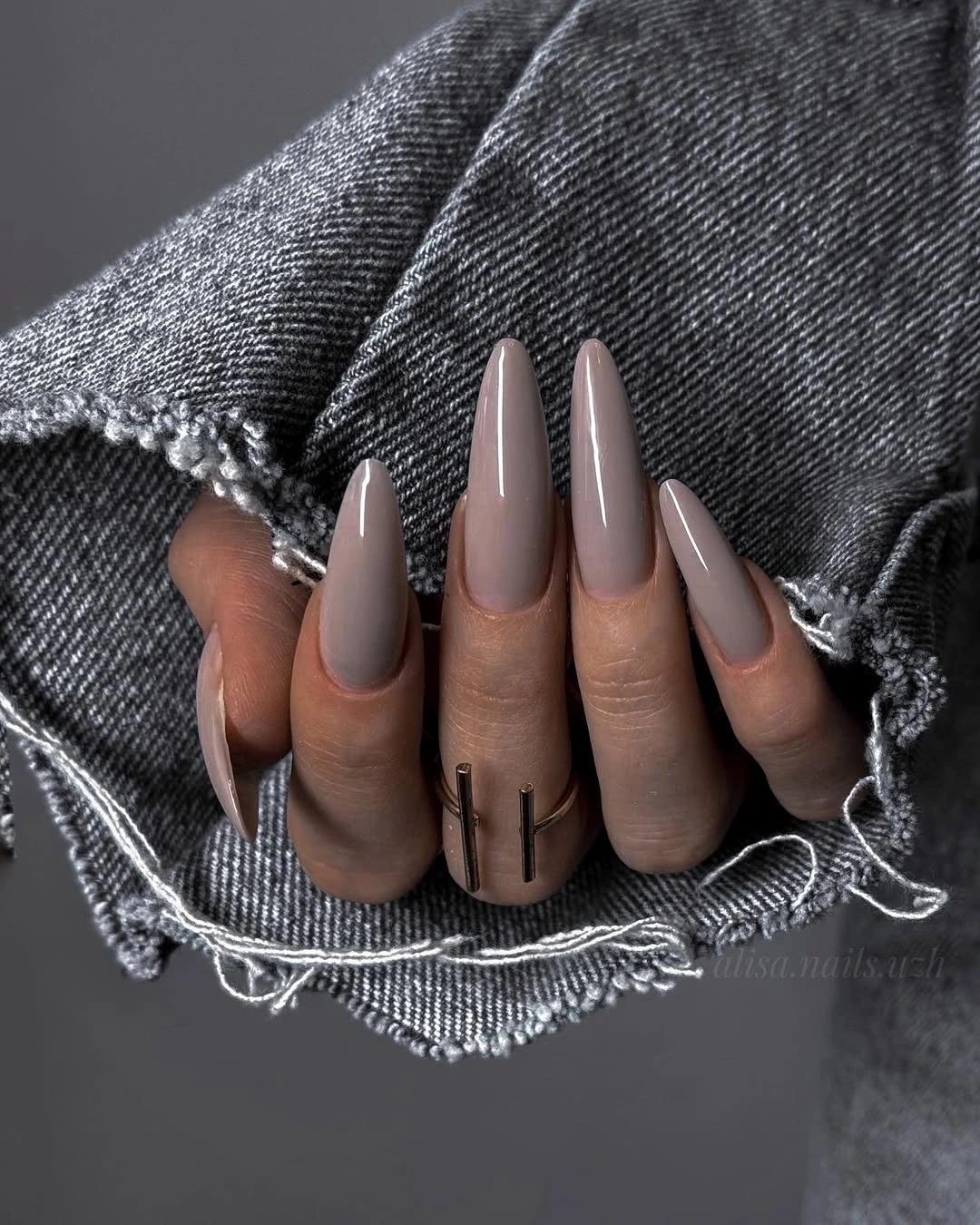 Long almond nails in glossy cool taupe beige