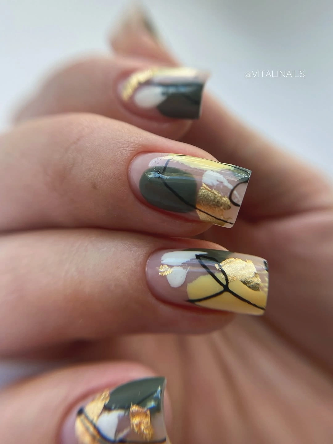 Medium square nails with olive yellow and cream abstract accents
