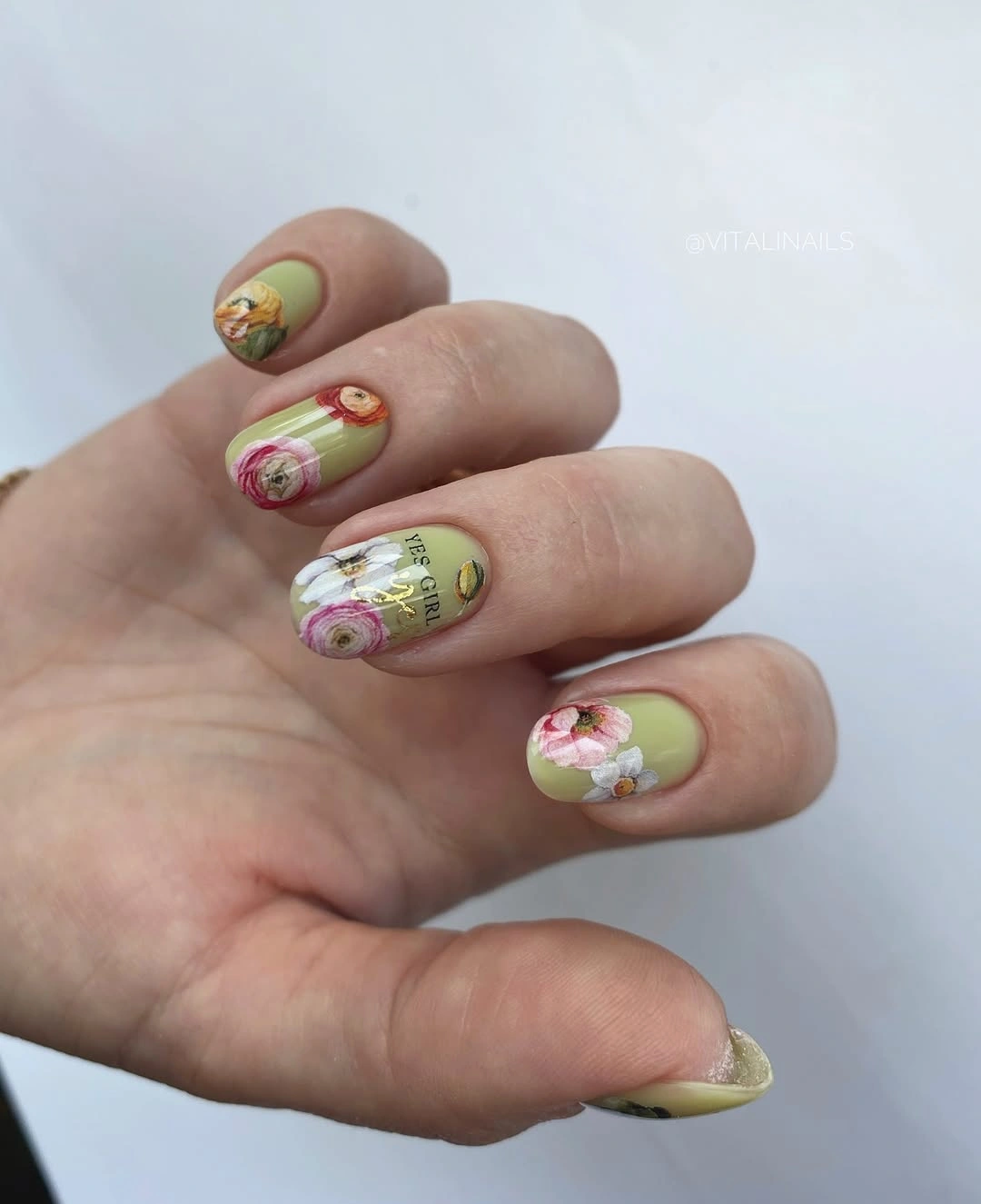 Long olive almond nails with pink coral floral accents