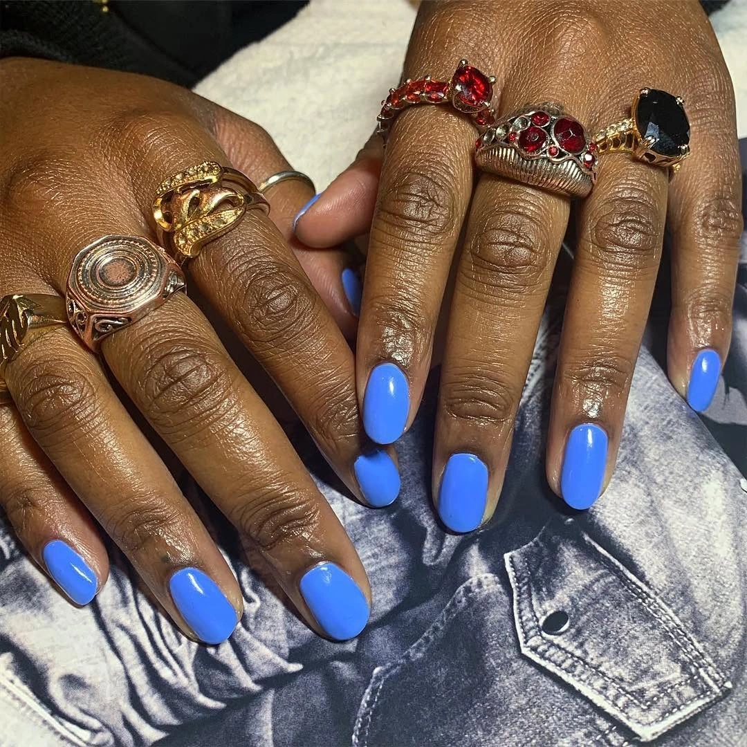 Long almond nails in glossy vivid cobalt blue