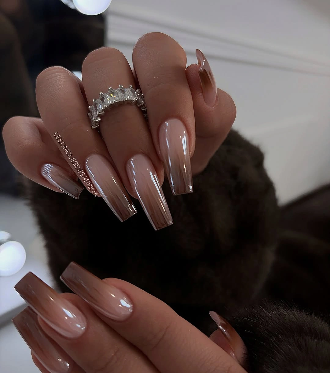 Long coffin nails with translucent rosy nude depth