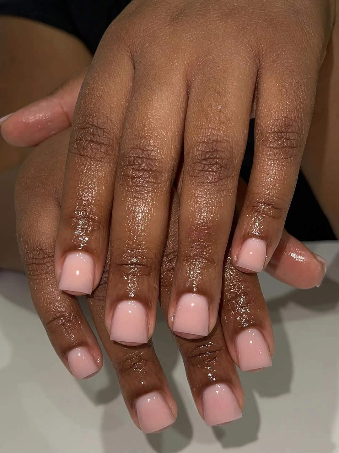 Short square nails with glossy blush pink polish