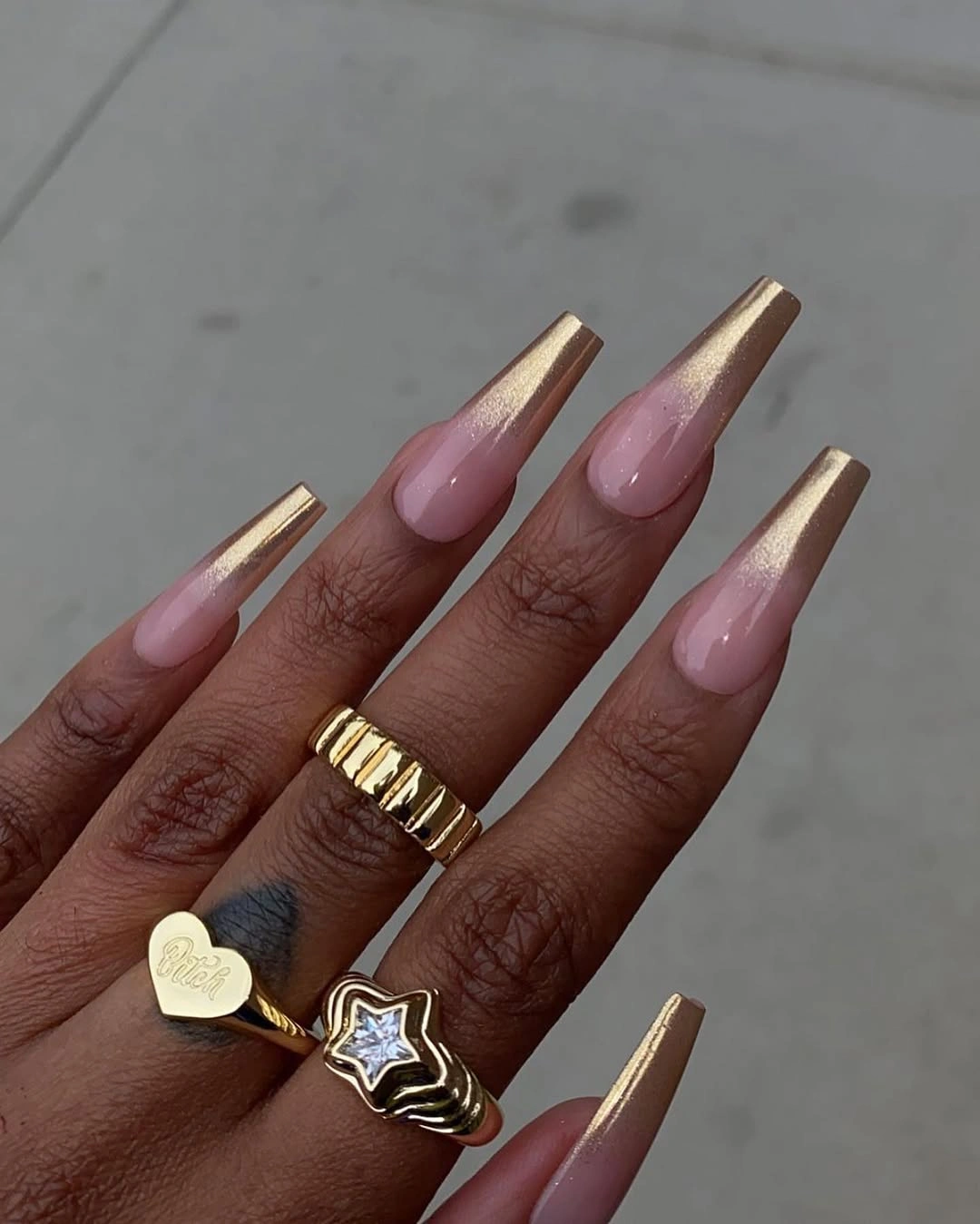 Long coffin nails with champagne metallic tips