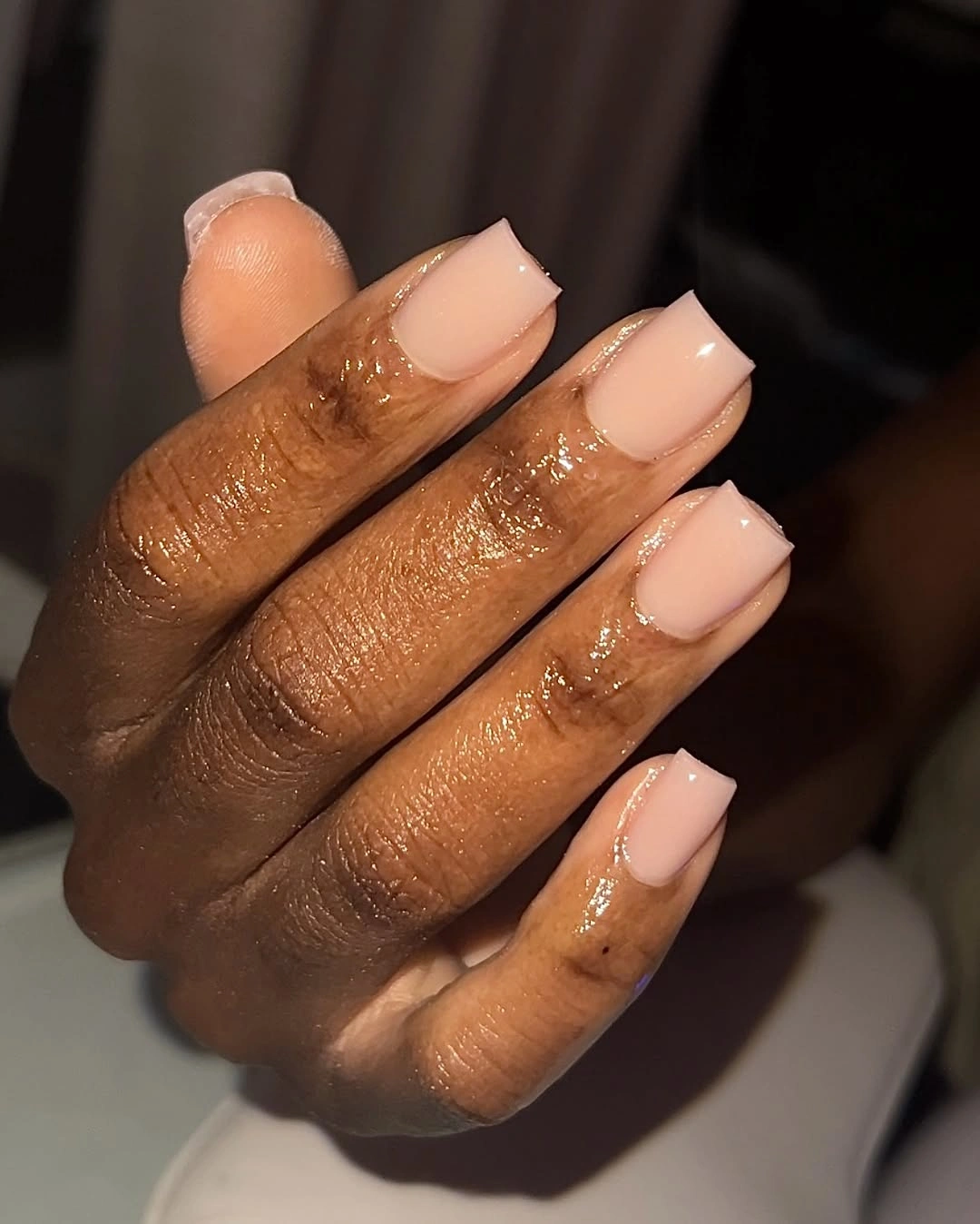 Short milky pink square nails with glossy finish