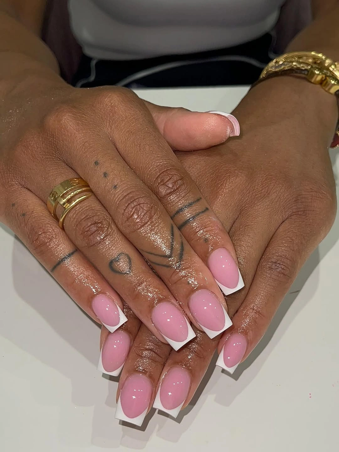 Clean square French nails with glossy pink bases