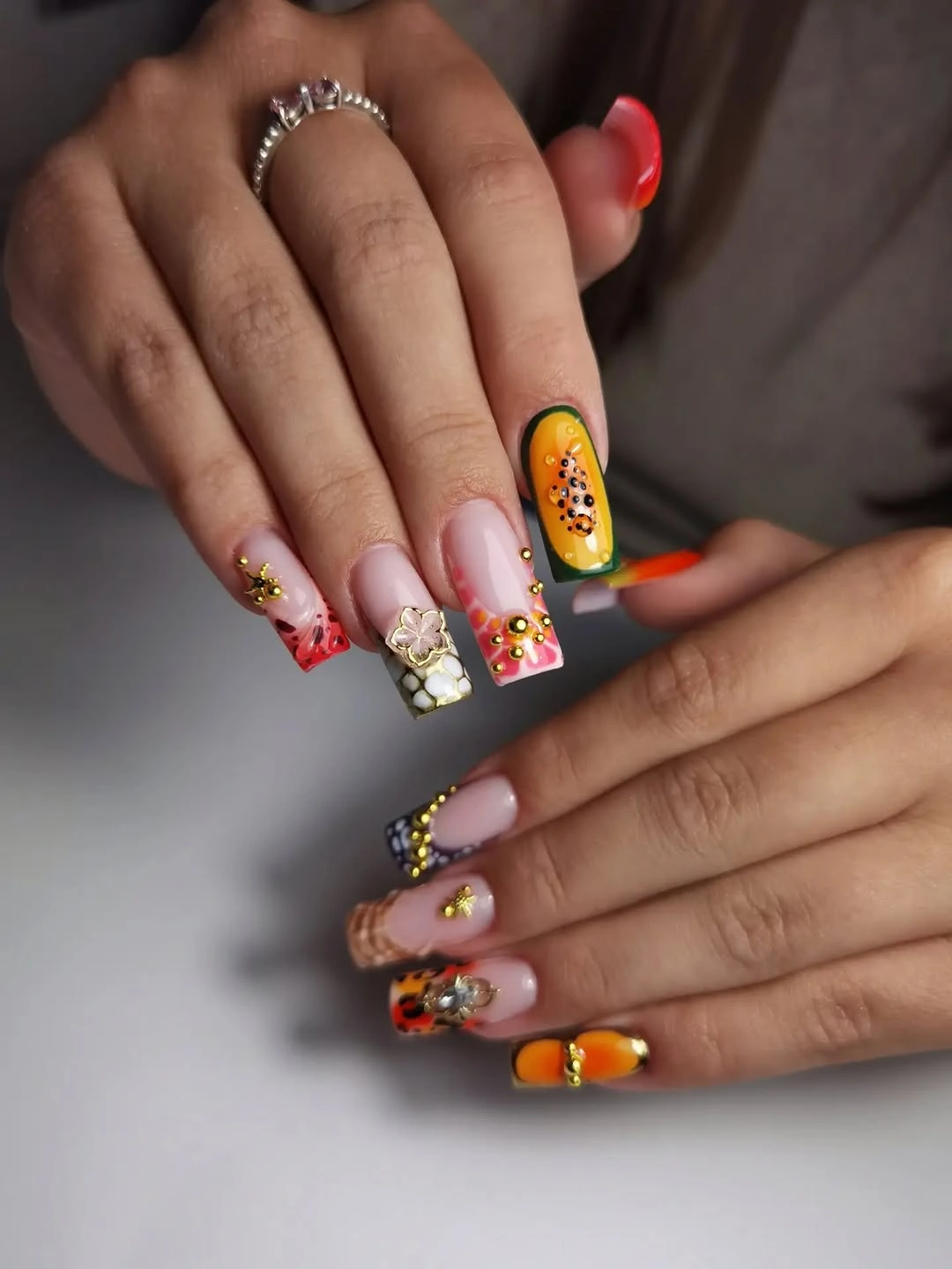 Long square nails with colorful illustrated accents
