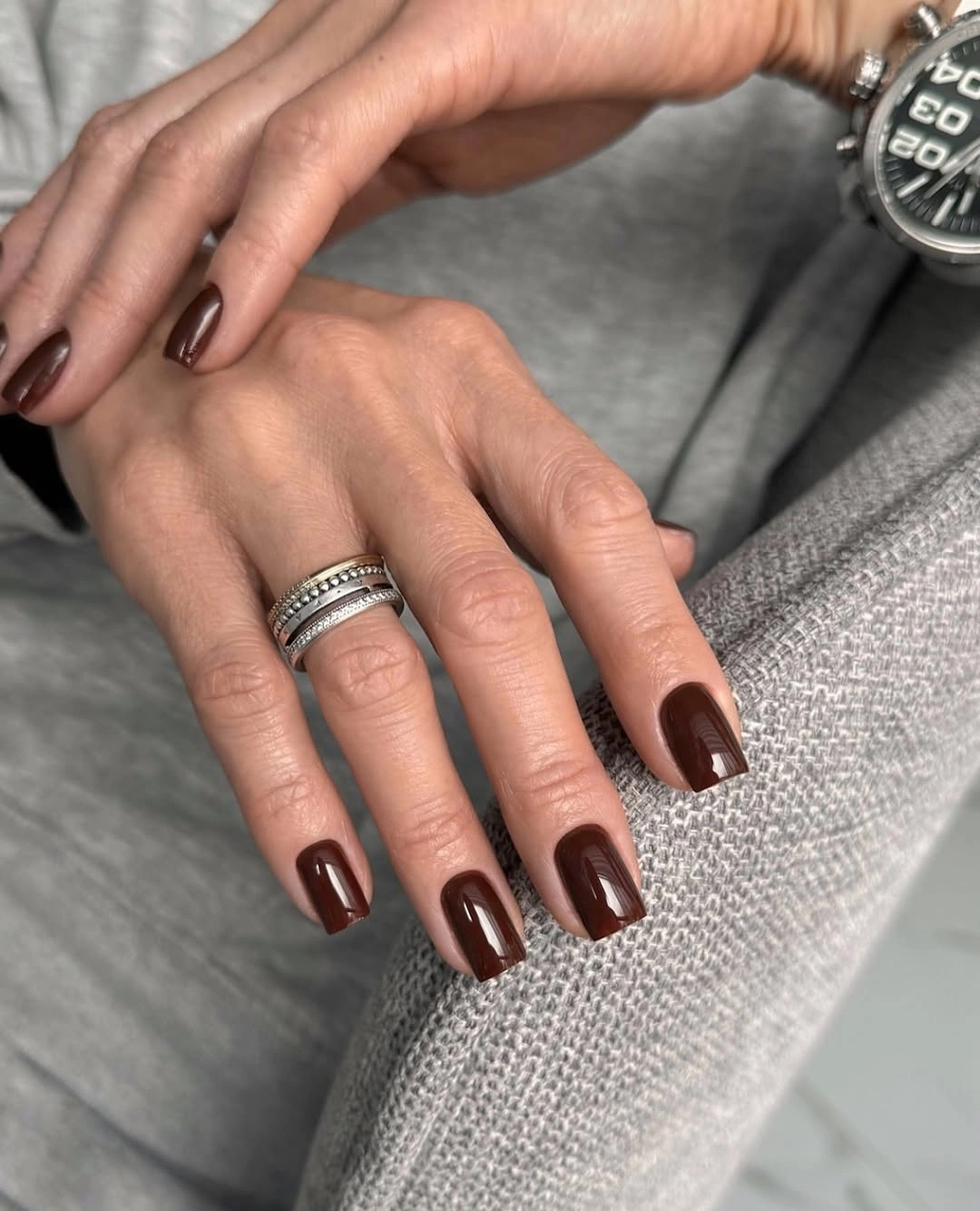 Rich brown almond nails with a smooth solid finish