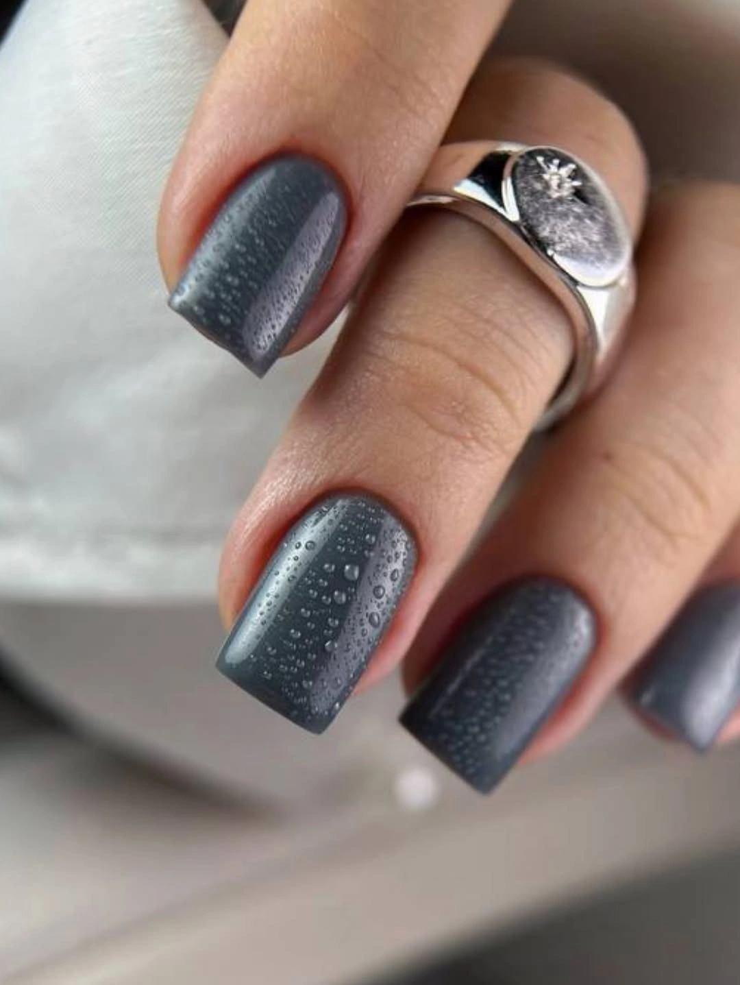 Slate blue-gray square nails with subtle reflective specks