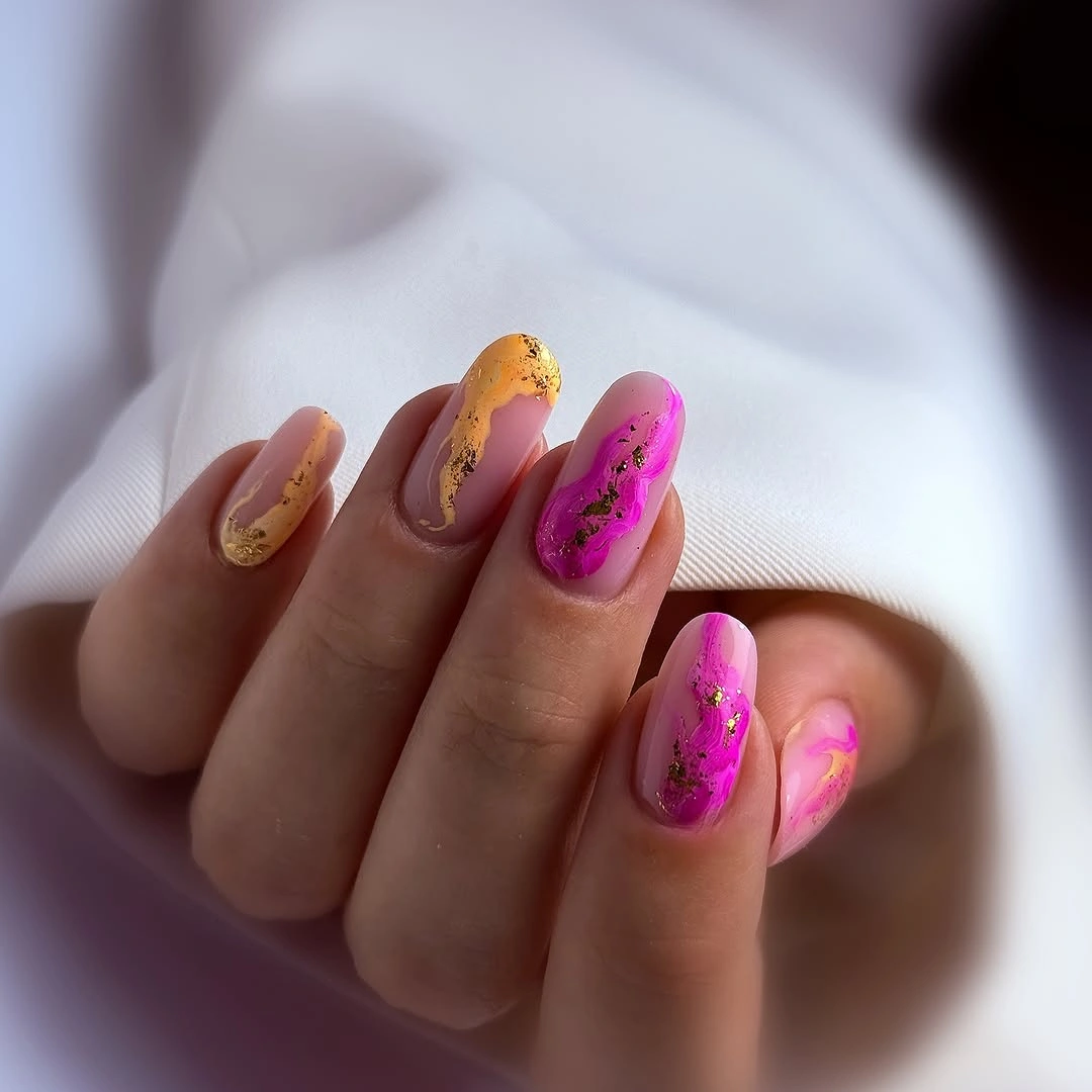 Medium almond nails mixing hot pink citrus shades and art