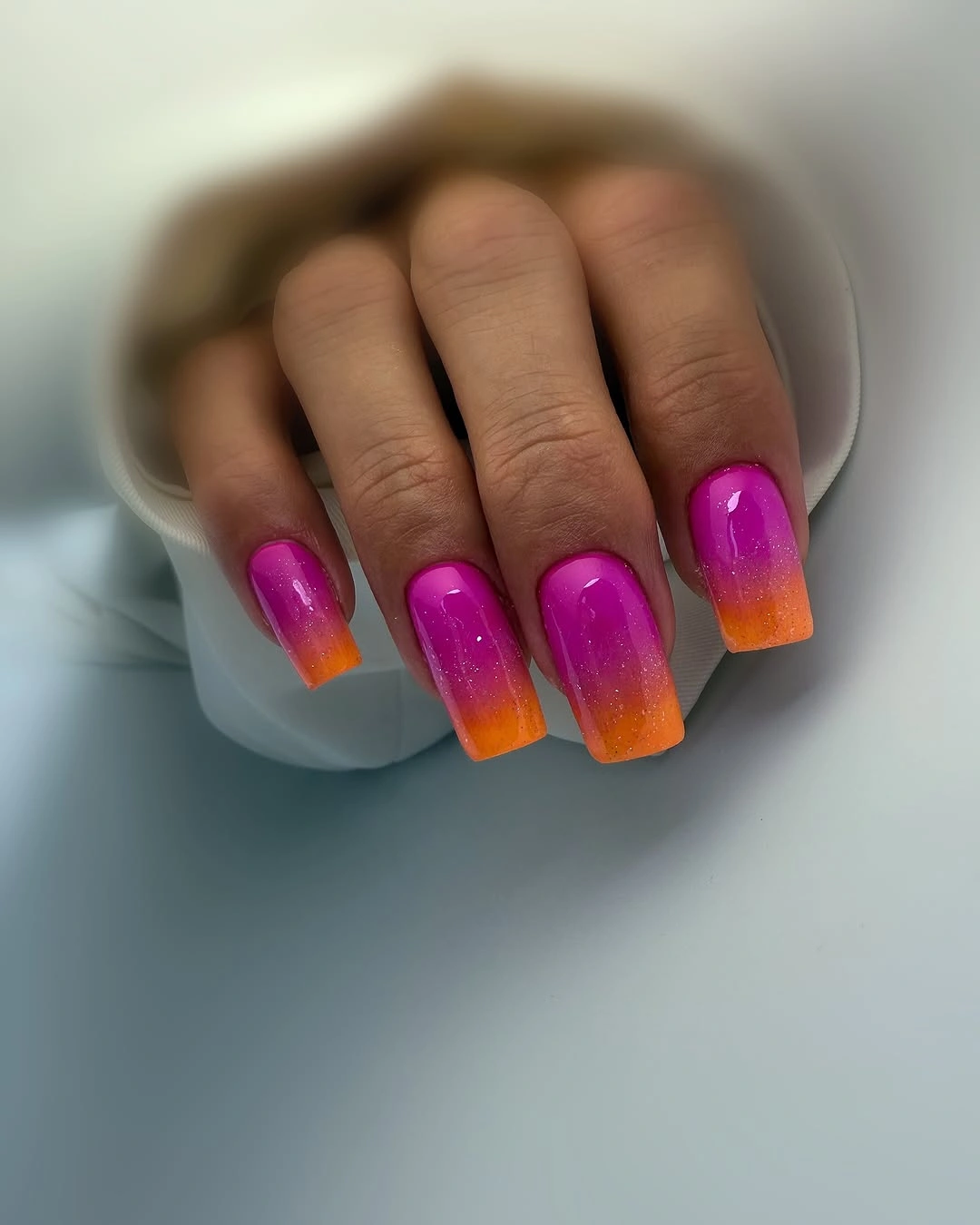 Medium coffin nails with vivid magenta orange color shift