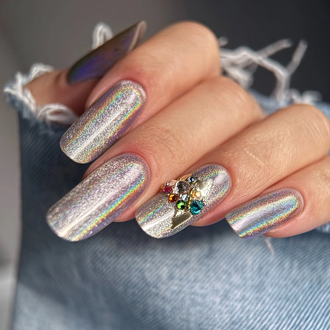 Long coffin nails in silver purple with one sparkling accent