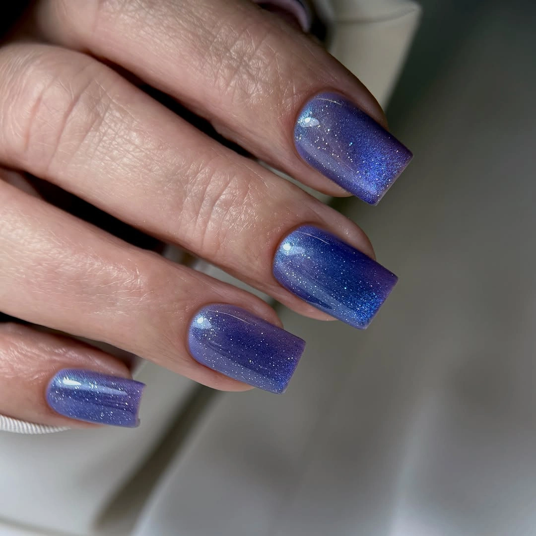 Short square nails in glossy periwinkle blue