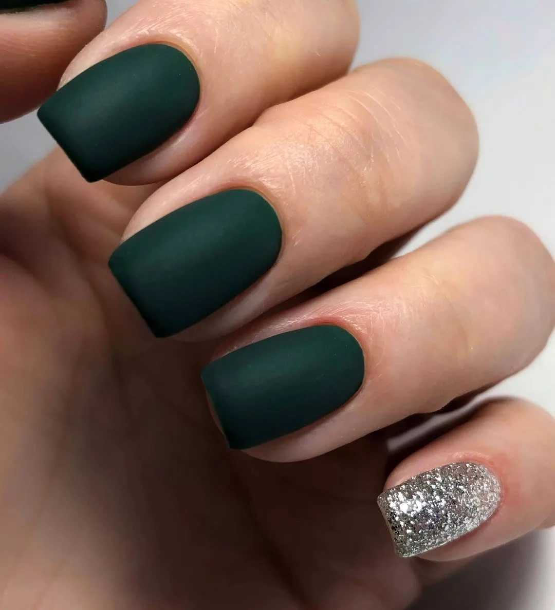 Forest green matte square nails with one silver accent