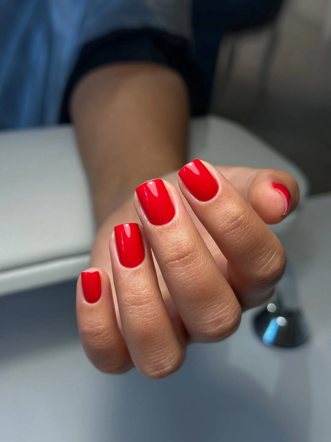 Clean short square nails in glossy red