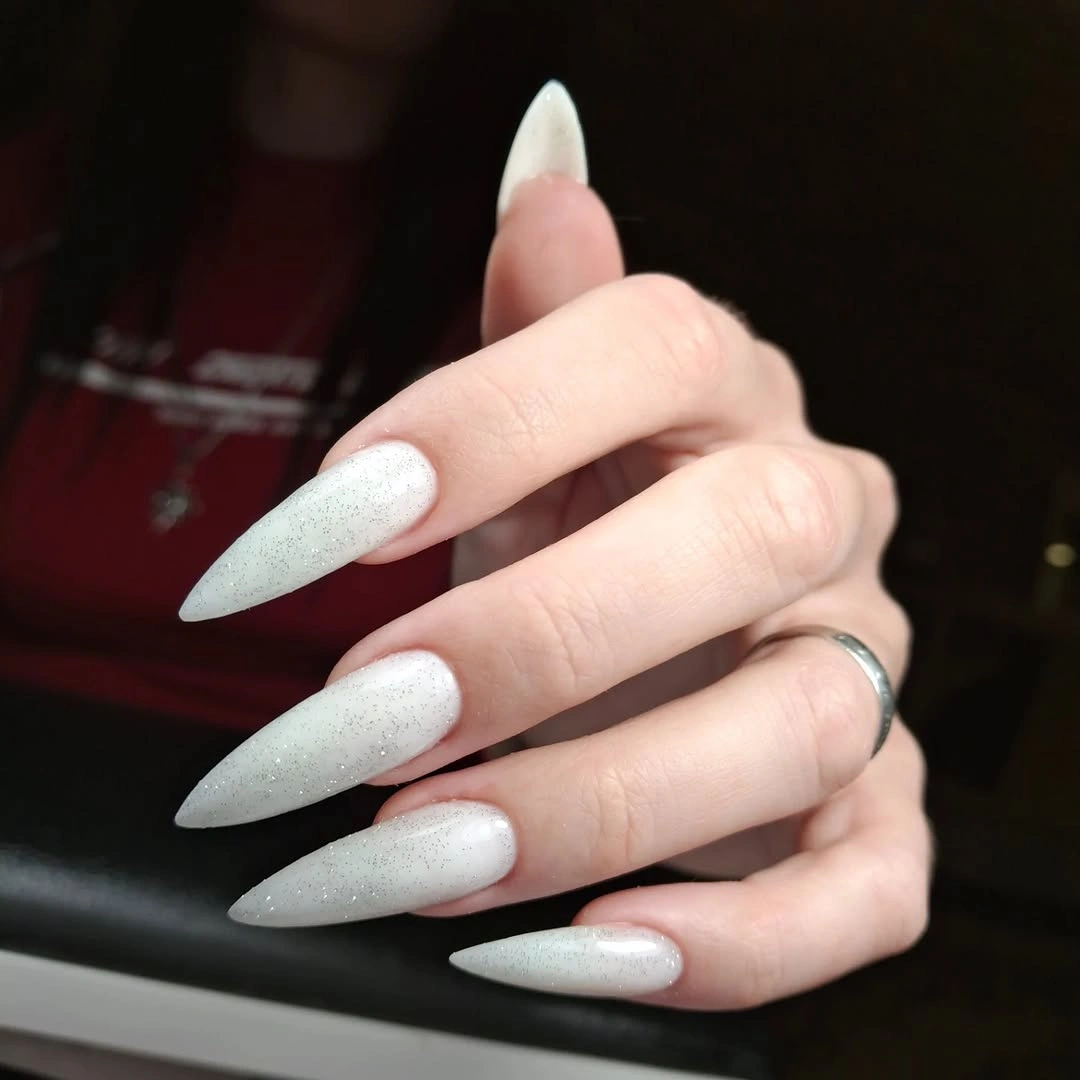 Long almond nails with soft pearly white shimmer