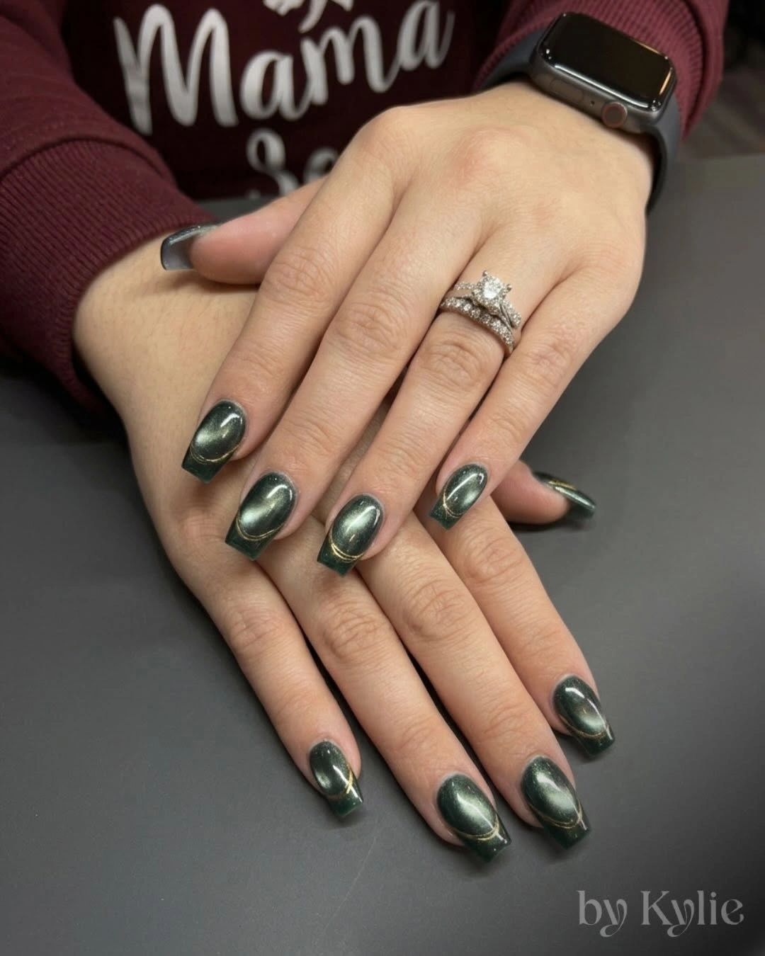 Glossy dark green short rounded-square nails