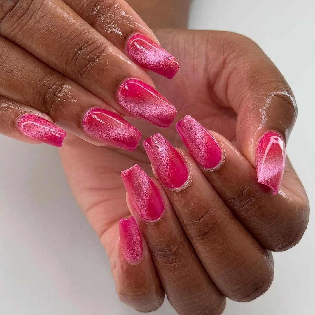 Bright pink square nails with a soft shimmering finish
