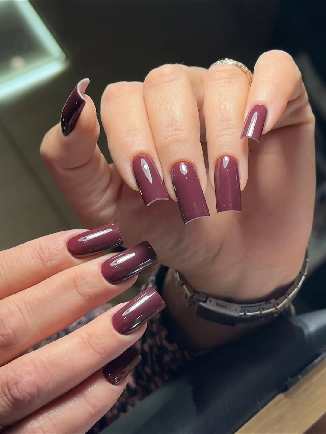 Long square nails in glossy plum burgundy color