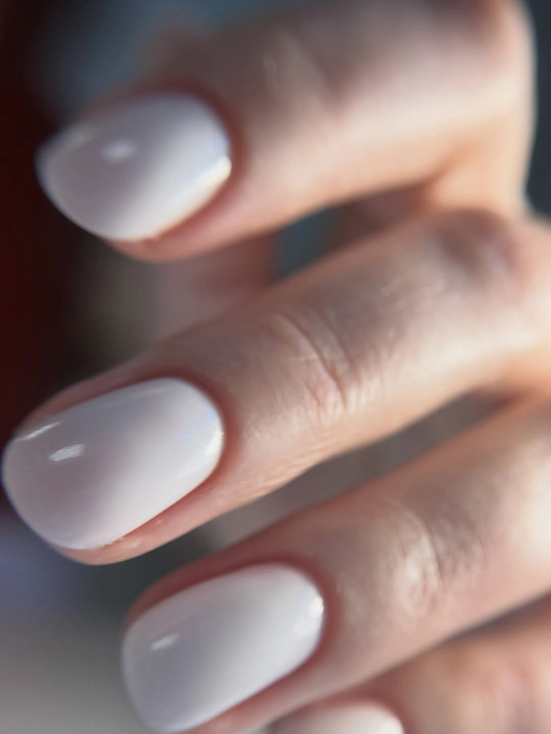 Short rounded square nails in glossy milky white