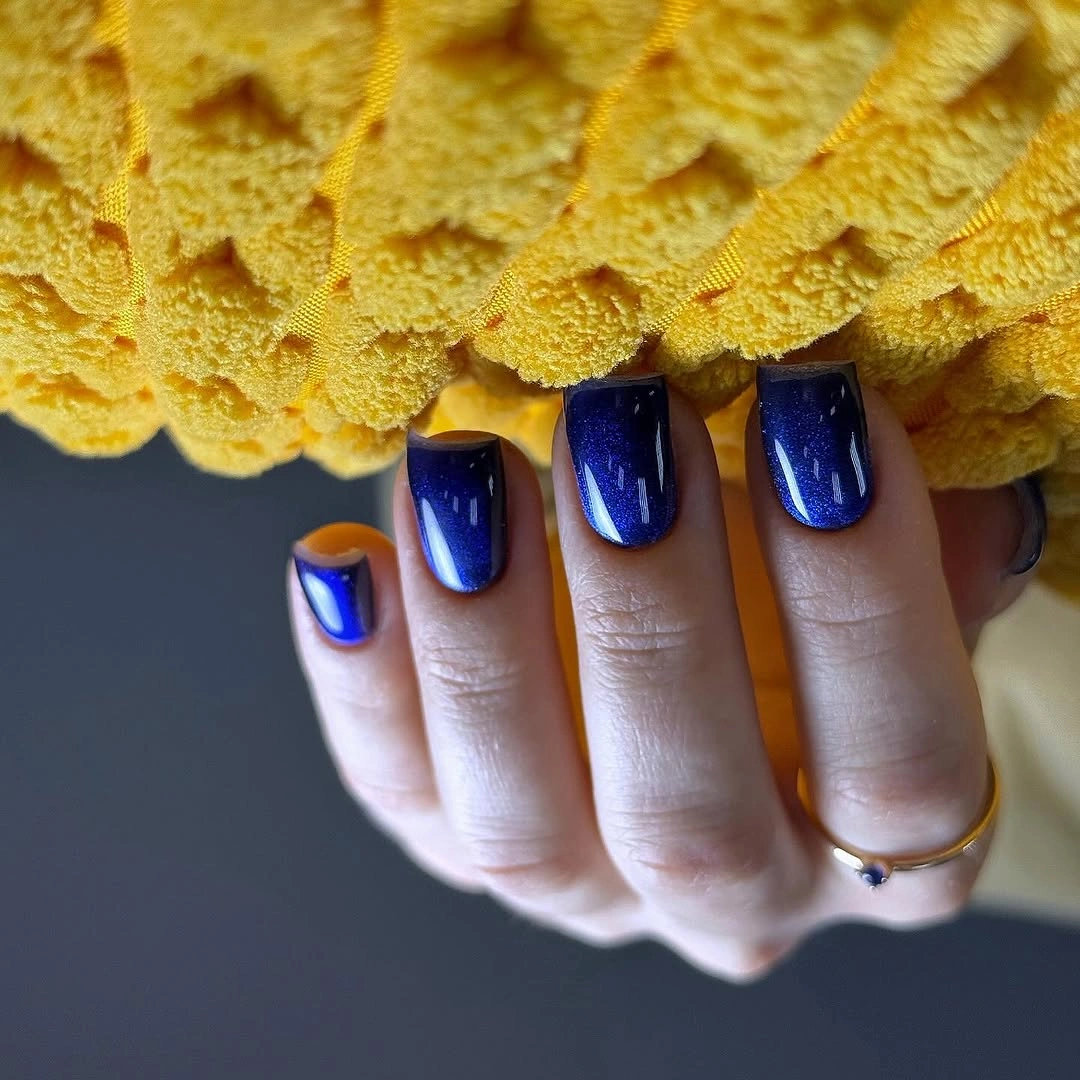 Short square cobalt blue nails with subtle fine shimmer
