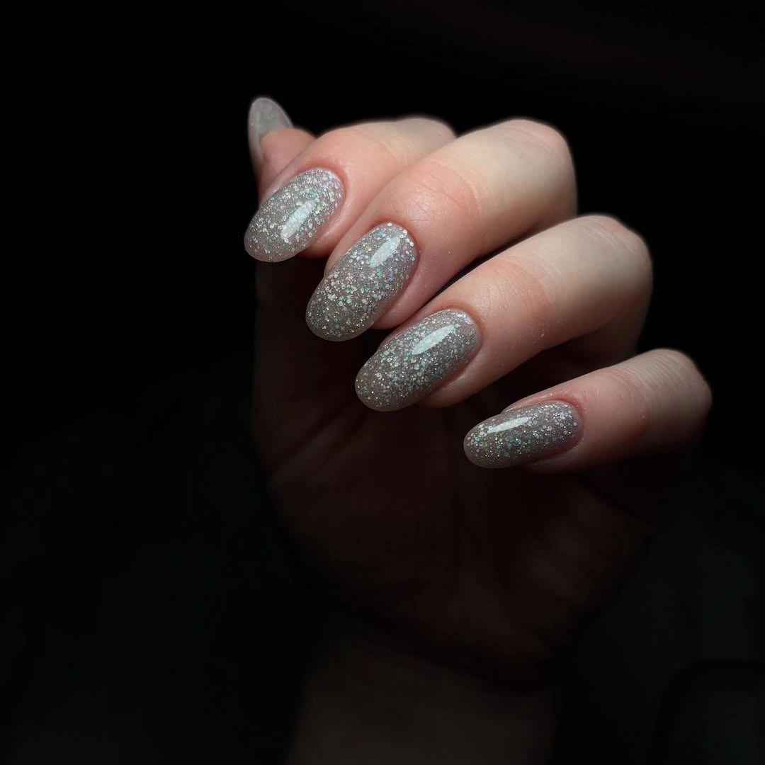 Smoky taupe glitter almond nails for wedding guests