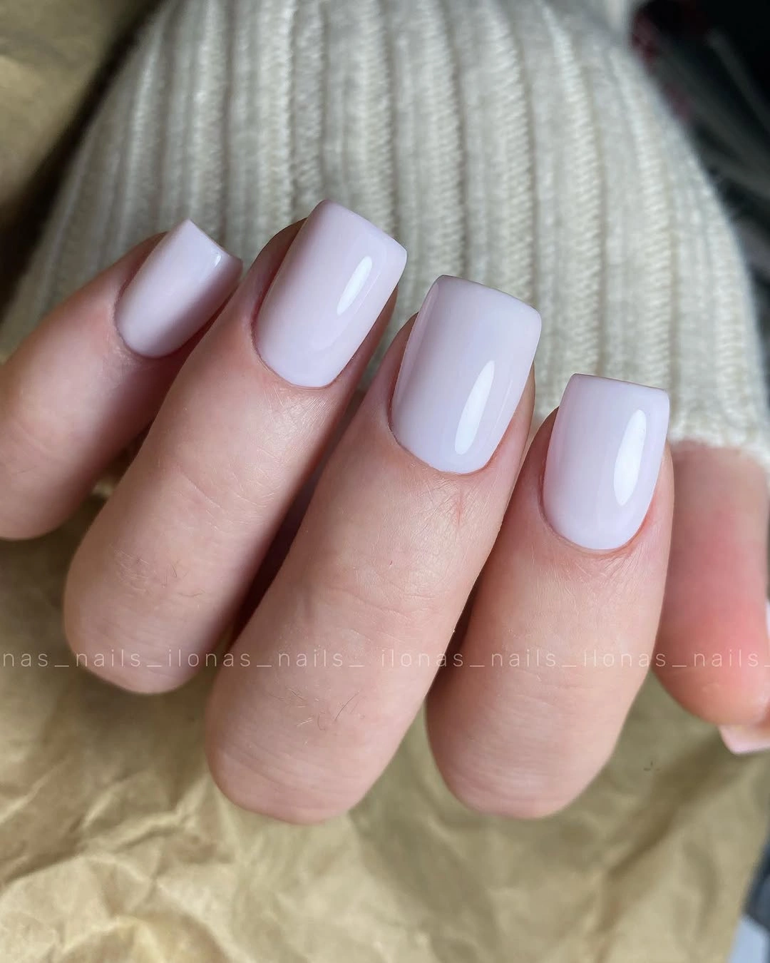 Short glossy milky square nails for a simple wedding look