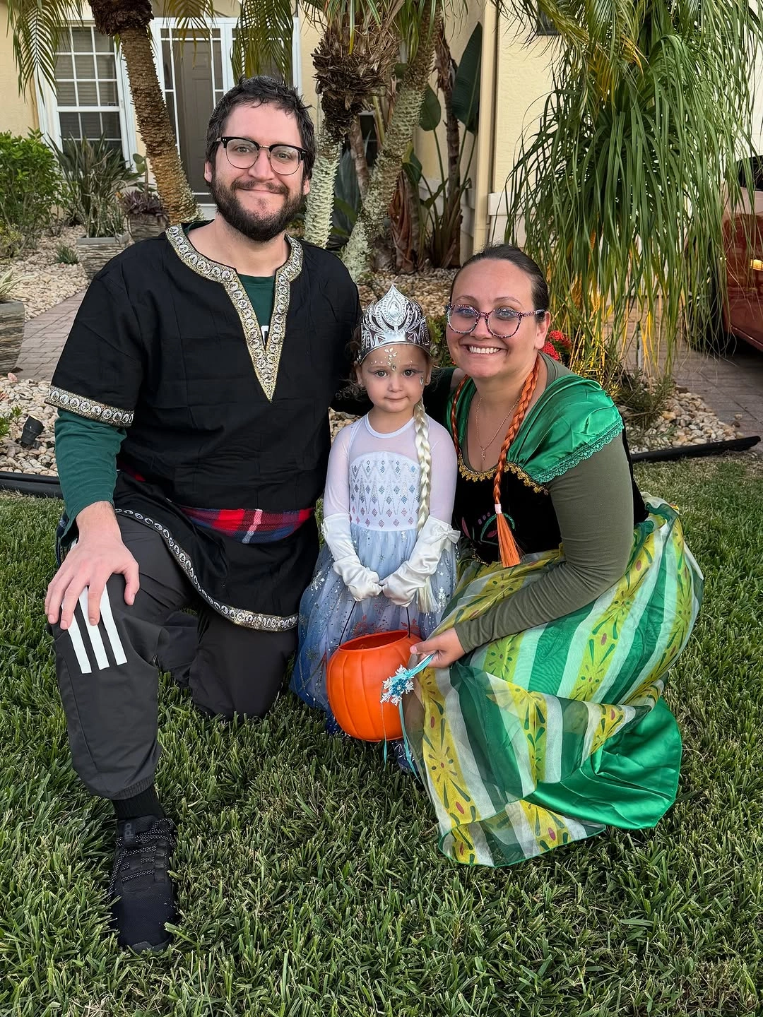 Sea inspired family costumes with black green and pale blue layers