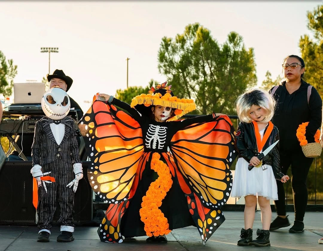 Large Halloween group with butterfly wings skeleton suit and dark costumes