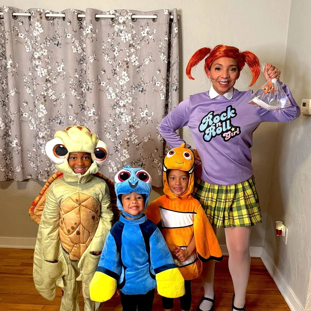 Colorful family costumes with purple yellow blue and orange outfits